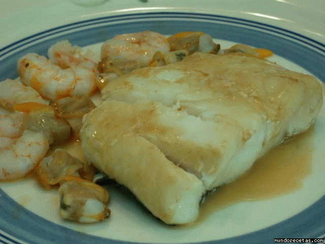 Receta de Merluza con gambas y berberechos Receta de Merluza con gambas y berberechos