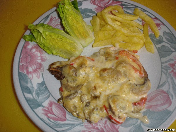 Receta de Chuletas gratinadas con queso al ajo y perejil