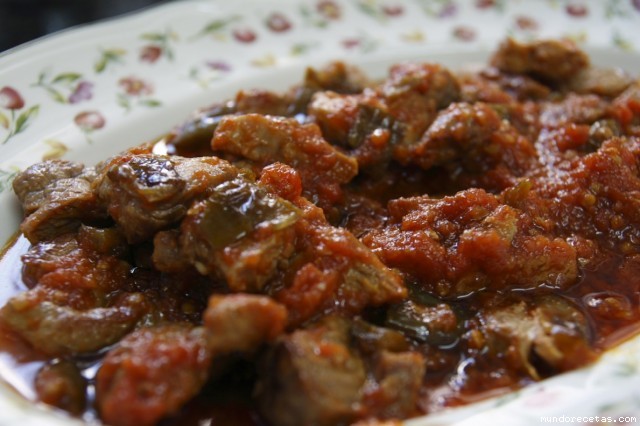 Receta de Solomillo de cerdo con tomate y pimientos verdes Receta de Solomillo de cerdo con tomate y pimientos verdes