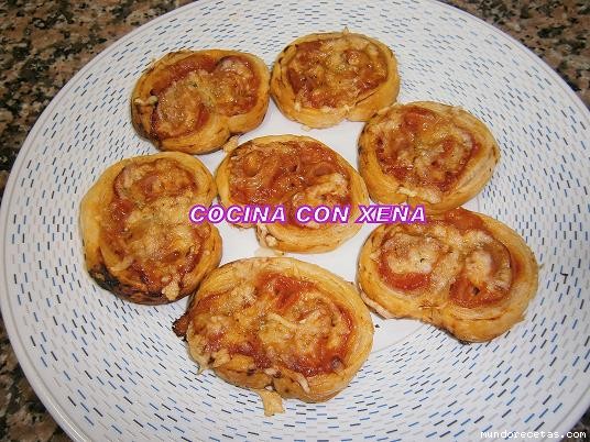 Receta de Palmeritas de hojaldre tipo pizza Receta de Palmeritas de hojaldre tipo pizza